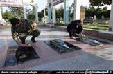 غبار روبی و گل افشانی گلزار شهدا گمنام بهمئی به دست امدادگران هلال احمر